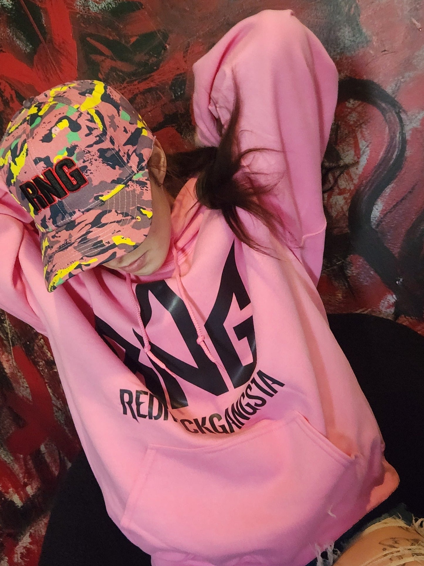 Model wearing RNG neon camo hat